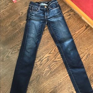 AE darker “skinny fit super stretch” jeans